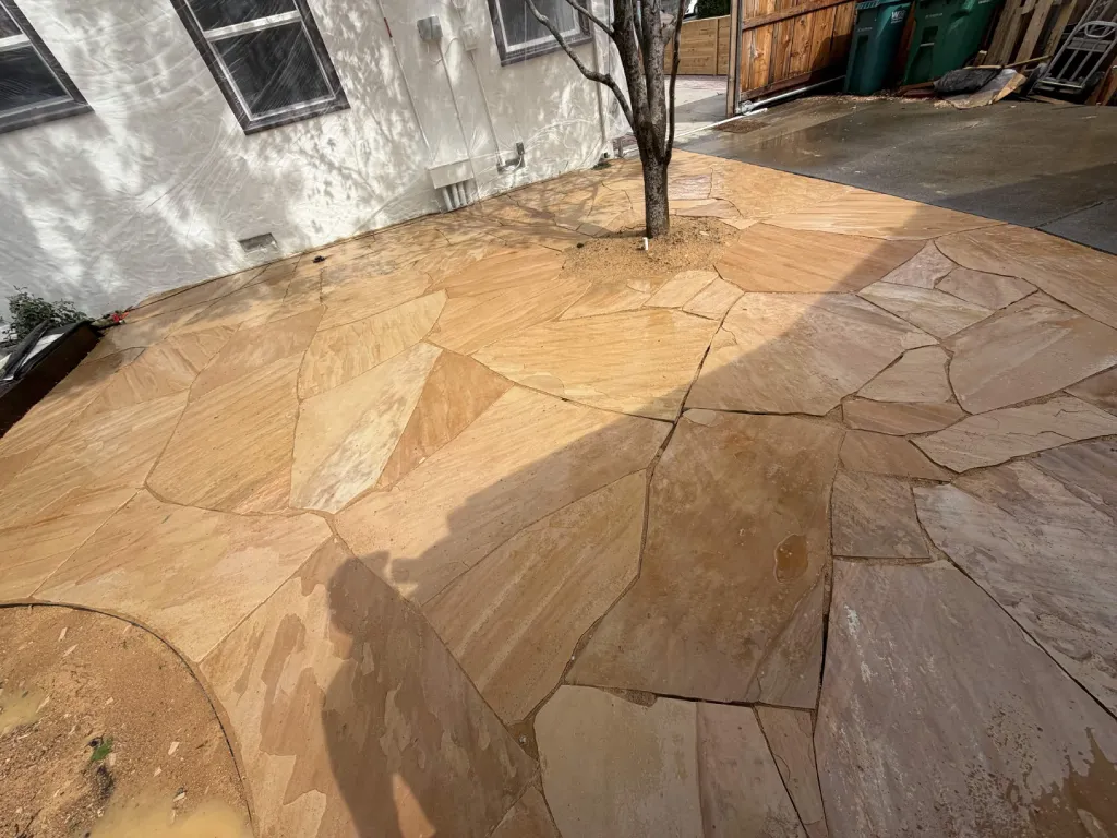 Finished flagstone patio with natural stone pattern
